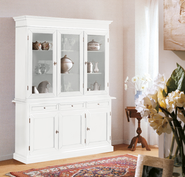 Cristalliera in legno finitura laccato bianco opaco, a 3 porte, 3 cassetti e 3 ante in vetro