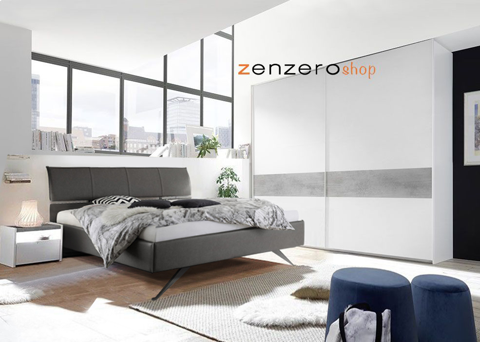 Camera matrimoniale con letto in ecopelle cemento, armadio con fascia beton e comodini bianchi opachi