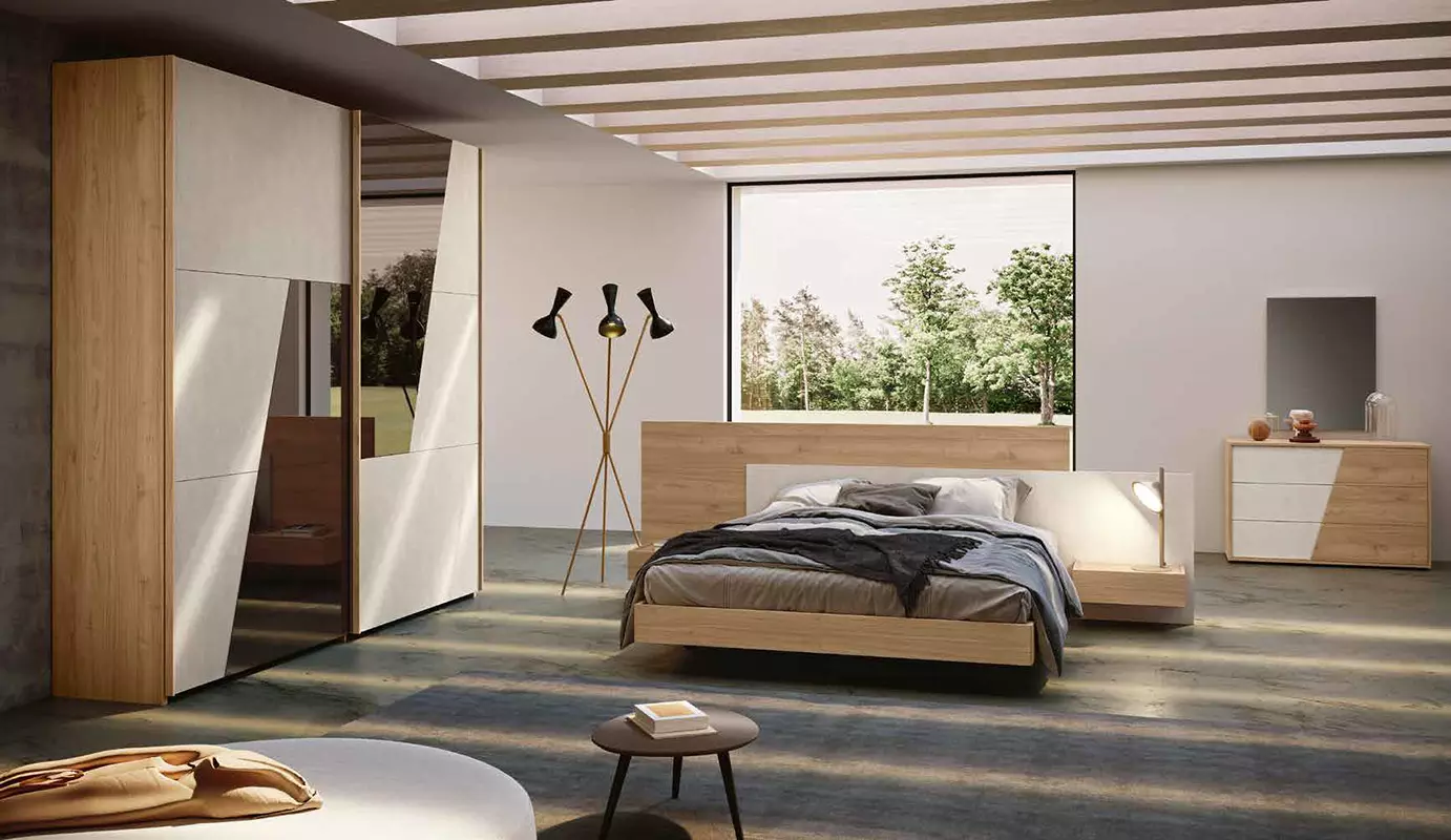 camera con letto in legno