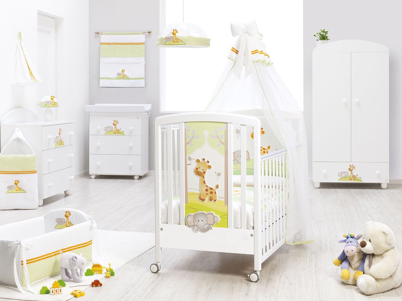 Culla neonati Melman bianca  con ruote e decori colorati