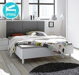 Letto bianco opaco con testiera grigio con forme geometriche 