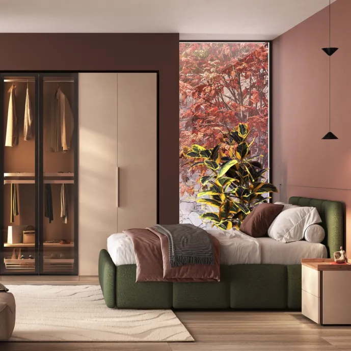 Camera matrimoniale con armadio battente, letto e coppia comodini