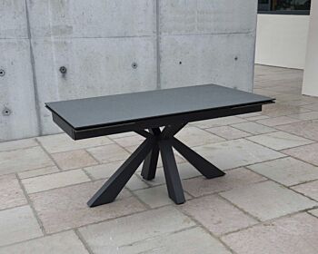 Tavolo di design allungabile con piano in vetro ceramica finitura pietra nera