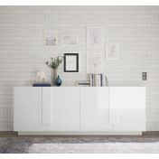 Soggiorno bianco moderno con tavolo, credenza e colonna