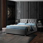 letto cuscini grigi