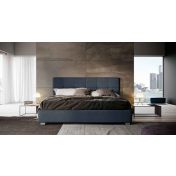 Letto matrimoniale imbottito blu notte, testata retrofinita