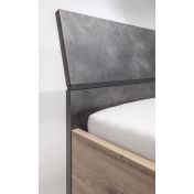 Letto Industry con testata ricurva in finitura Rovere e Grigio smoke