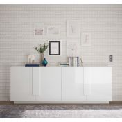 Soggiorno bianco moderno con tavolo, credenza e colonna