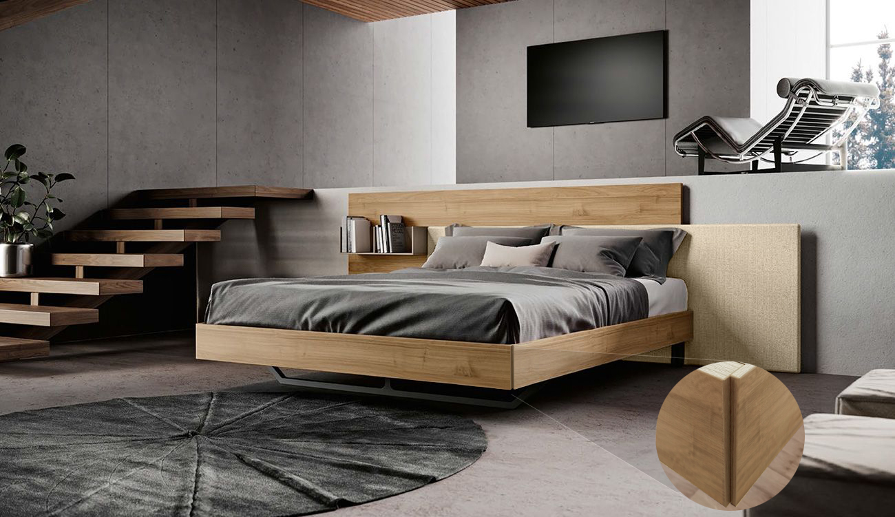 Letto matrimoniale con testiera in noce biondo e inserto tessuto panna, piedini in ferro