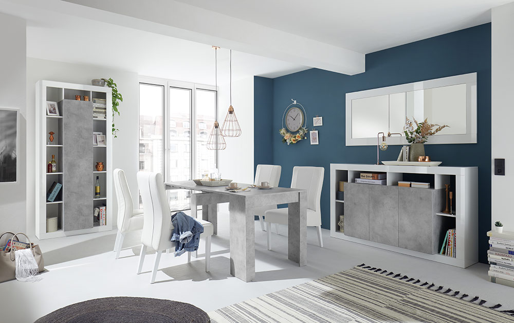 Soggiorno Bianco Lucido e cemento composto da consolle allungabile, specchio, madia 3 ante e libreria 