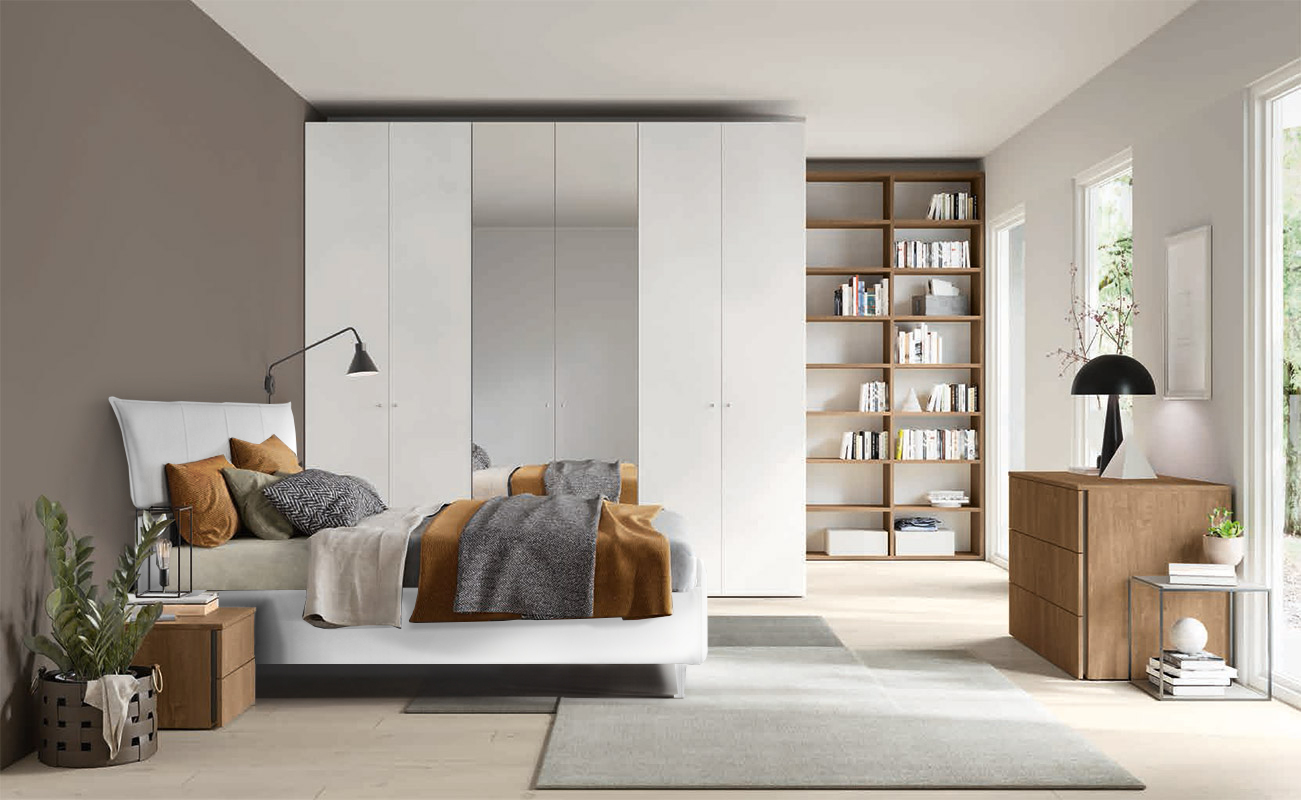 Camera con armadio battente 6 ante, letto in Ecopelle, finitura Cemento artico e Rovere Cognac