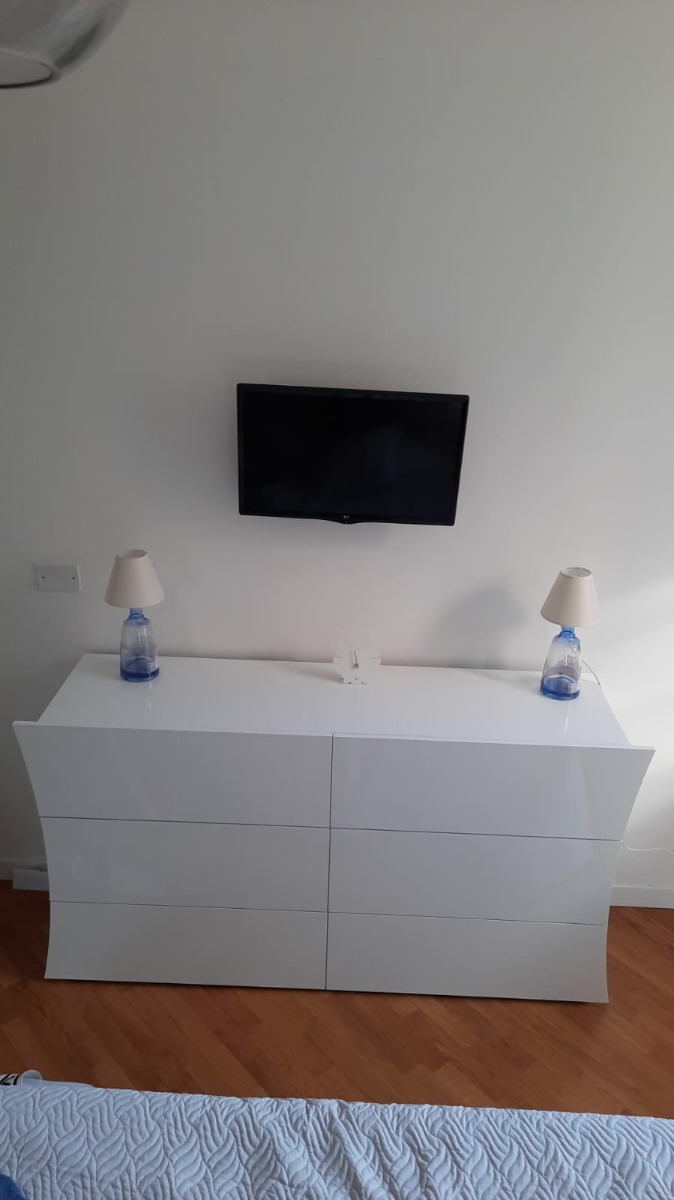 Comò linea arco con 6 cassetti grande in finitura bianco laccato lucido