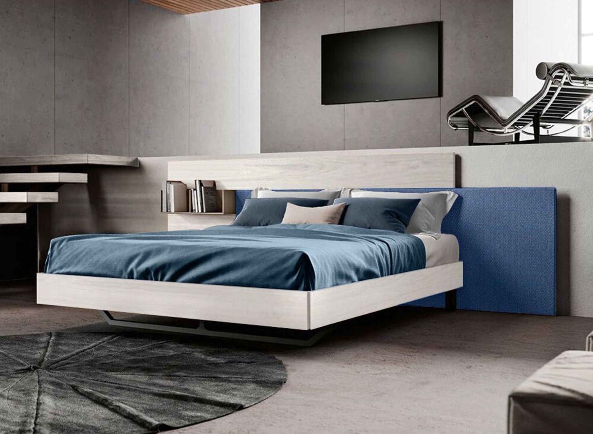 letto azzurro con comodini integrati